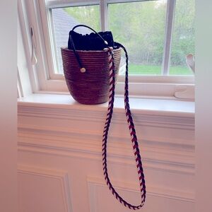 Cesta Collections Woven crossbody bucket bag